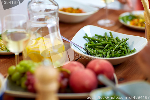 Image of vegetable salad in bowl on wooden table