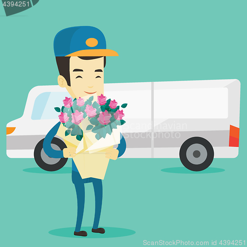 Image of Delivery courier holding bouquet of flowers.