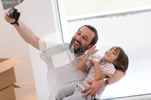 Image of selfie father and son