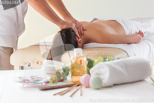 Image of The picture of beautiful woman in massage salon