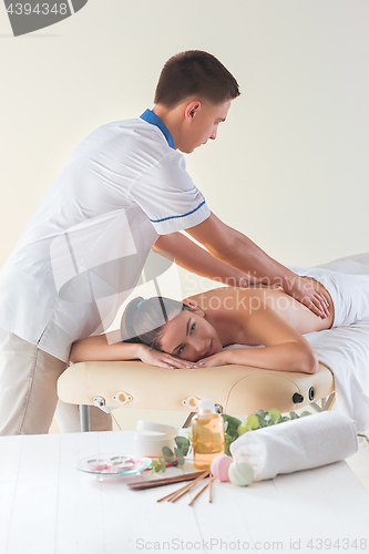 Image of The picture of beautiful woman in massage salon