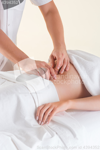 Image of The picture of beautiful woman in massage salon