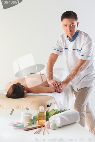 Image of The picture of beautiful woman in massage salon