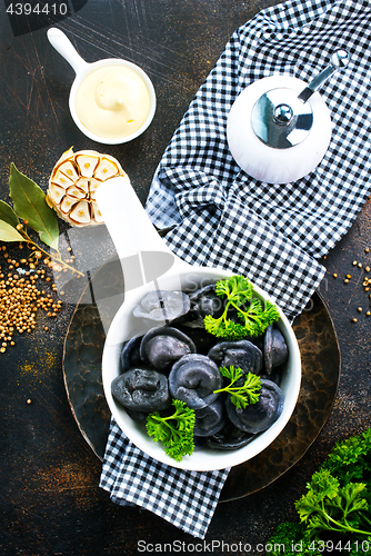 Image of black dumplings