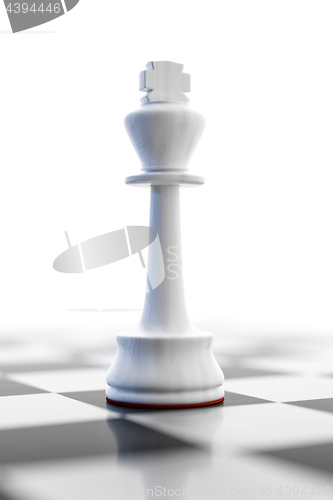 Image of a lonely white king on a chess board