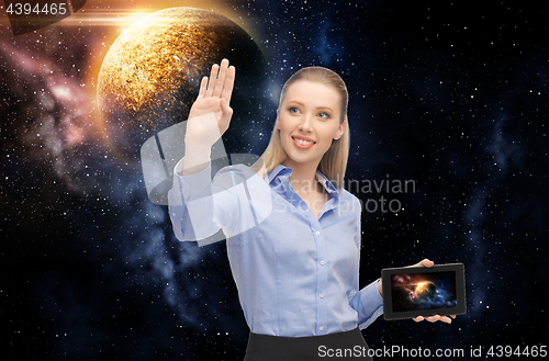 Image of smiling businesswoman with tablet pc over space