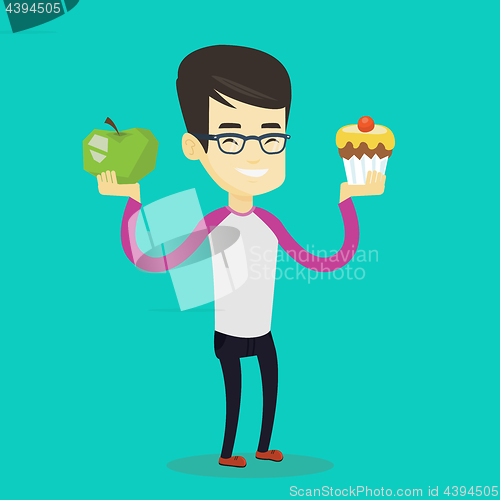 Image of Man choosing between apple and cupcake.