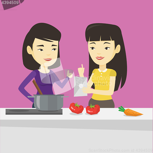Image of Women cooking healthy vegetable meal.