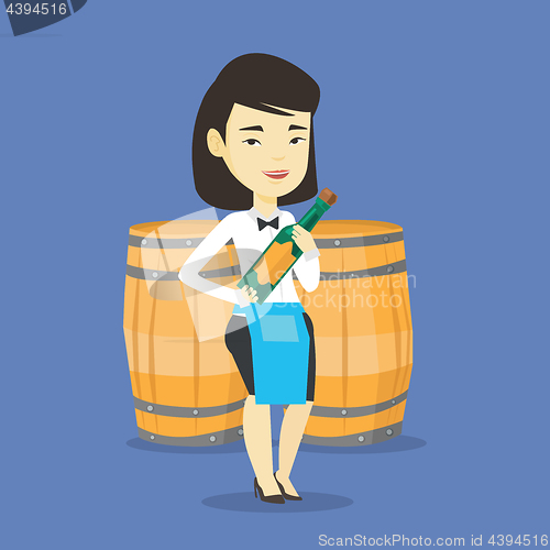 Image of Waitress holding bottle of alcohol.