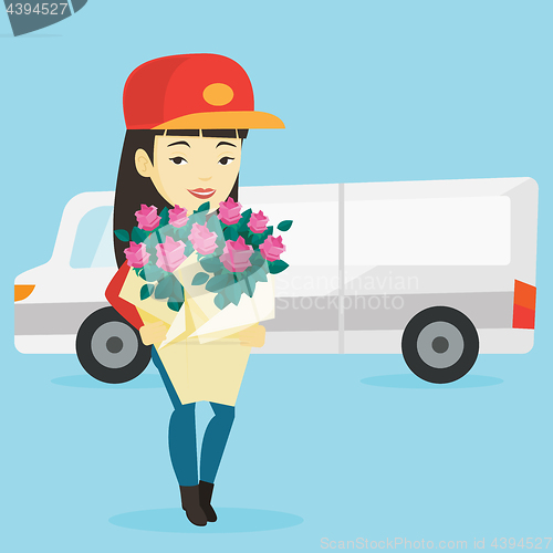 Image of Delivery courier holding bouquet of flowers.