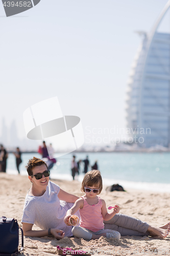 Image of Mom and daughter on the beach