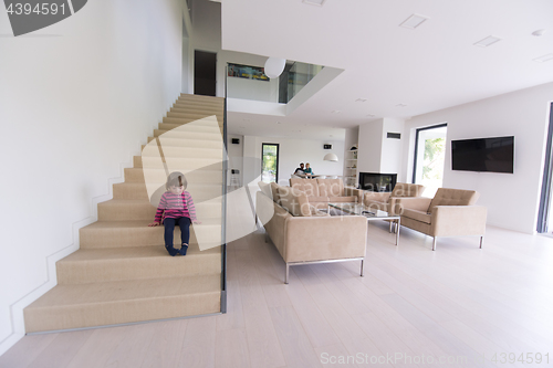 Image of family with little girl enjoys in the modern living room