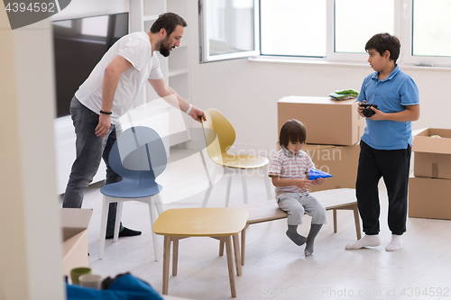 Image of boys in a new modern home