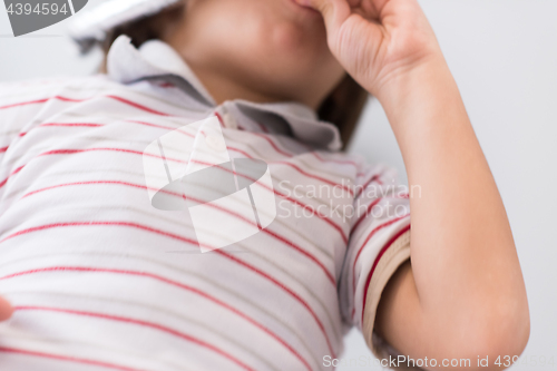 Image of kid blowing a noisemaker