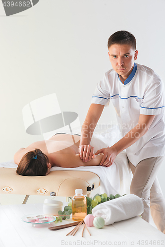 Image of The picture of beautiful woman in massage salon