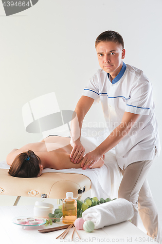 Image of The picture of beautiful woman in massage salon