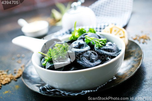 Image of black dumplings