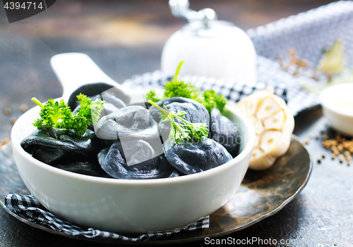 Image of black dumplings