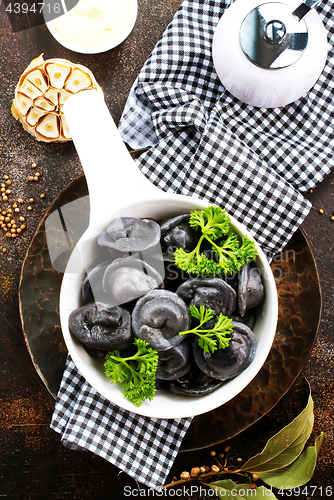 Image of black dumplings