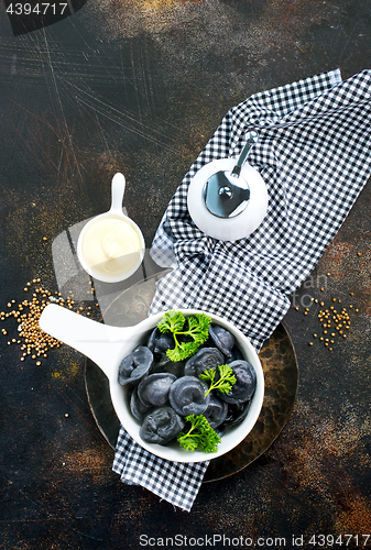 Image of black dumplings