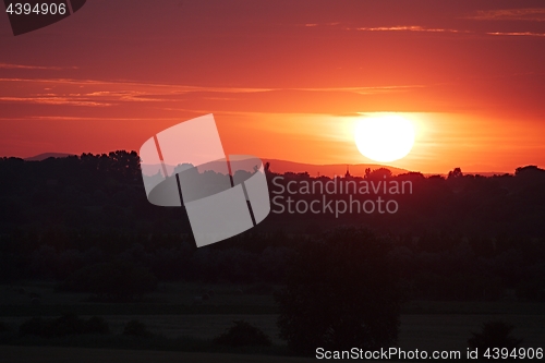 Image of Sunset Hilly Landscape