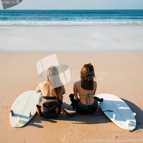 Image of Surfer girls at the beach 