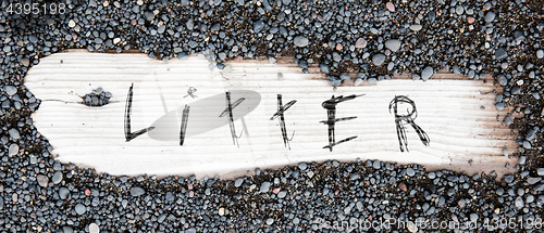 Image of Sand on planked wood - Litter