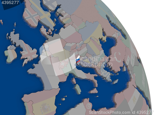 Image of Slovenia with flag on globe