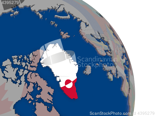 Image of Greenland with flag on globe