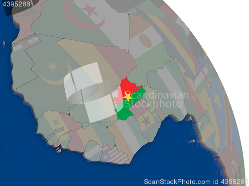 Image of Burkina Faso with flag on globe