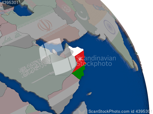 Image of Oman with flag on globe