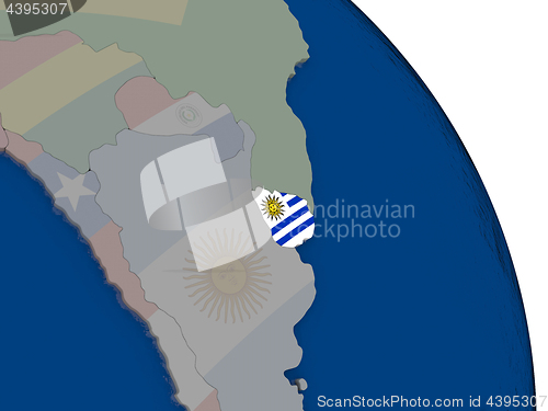 Image of Uruguay with flag on globe