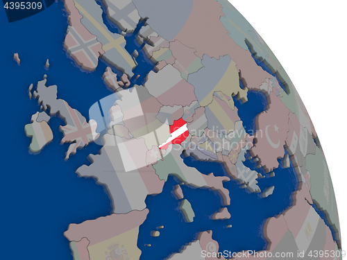 Image of Austria with flag on globe