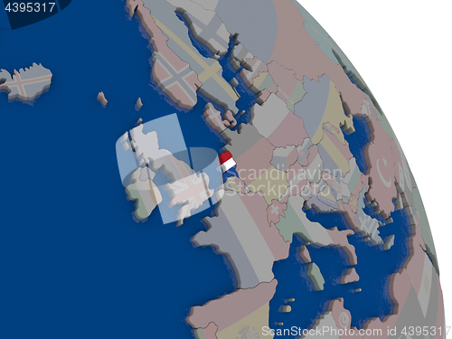 Image of Netherlands with flag on globe