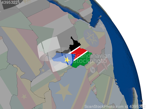 Image of South Sudan with flag on globe