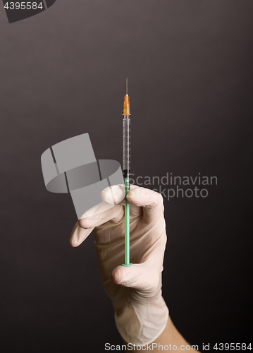 Image of Flicking syringe