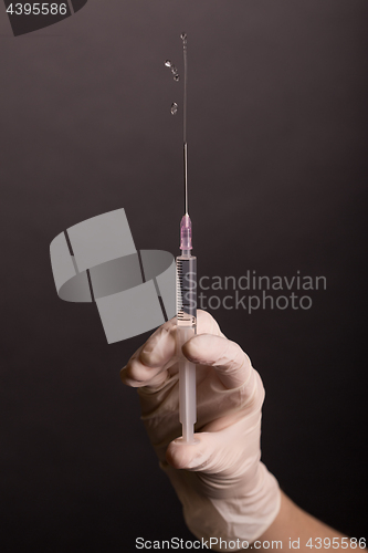 Image of Flicking syringe