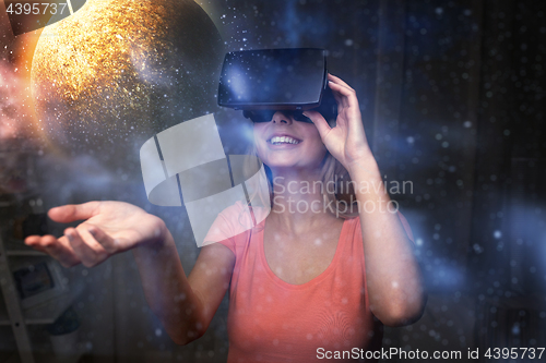 Image of woman in virtual reality headset or 3d glasses