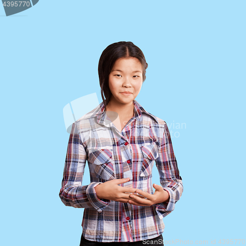 Image of Asian girl shows well done with both hands