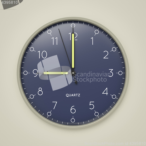 Image of a clock shows 9 o\'clock