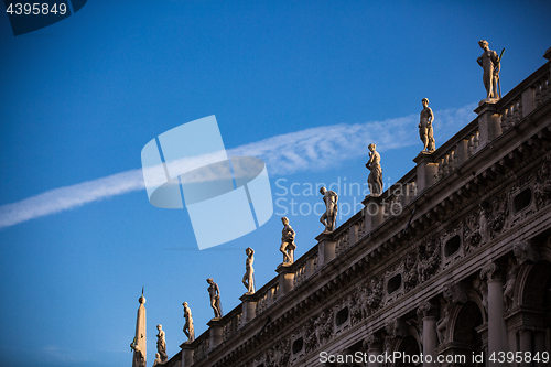 Image of Line of statues on a historical building in Venice, Italy