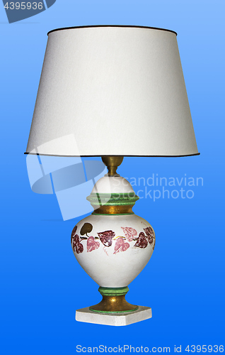 Image of Vintage table lamp on a blue background