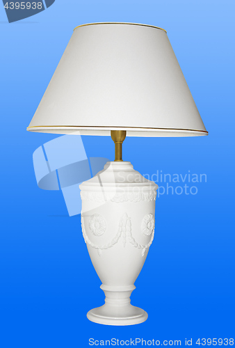 Image of Vintage table lamp on blue background