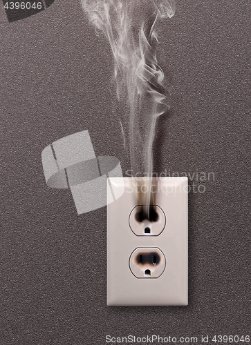 Image of dangerous electrical outlet