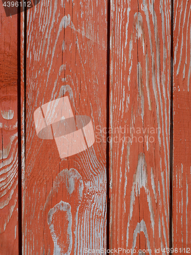 Image of Detail of wooden fence with peeling paint
