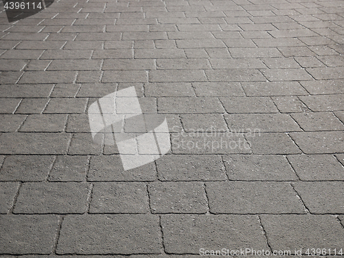 Image of Gray wet concrete pavement 