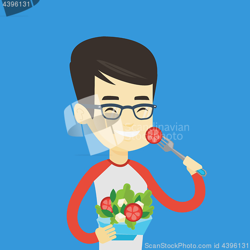 Image of Man eating healthy vegetable salad.