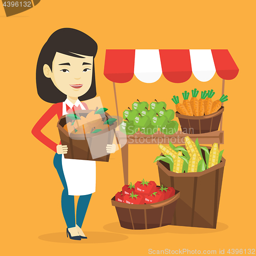 Image of Greengrocer with fruits and vegetables.