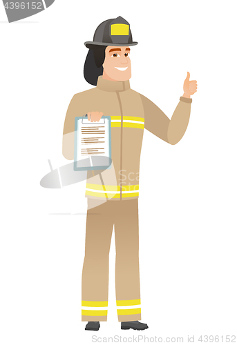 Image of Firefighter with clipboard giving thumb up.