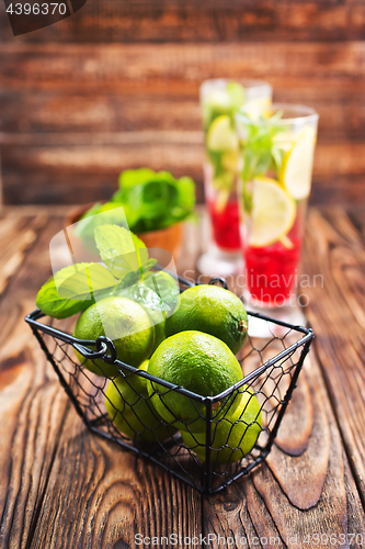 Image of fresh drink and limes